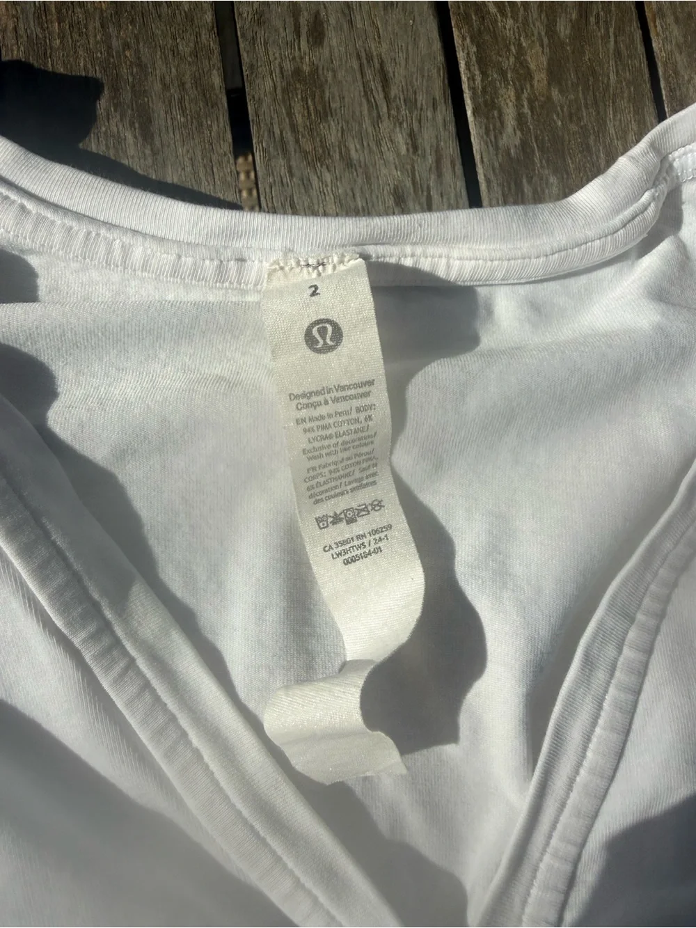 lululemon athletica White Long Sleeve V-Neck Top back in action , size 2
